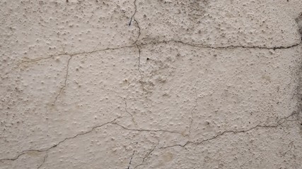 texture of a old concrete wall with cracks background