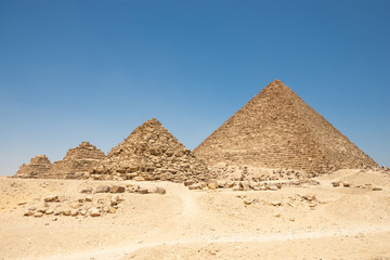 Fototapeta na wymiar Pyramids of Queens near the Pyramid of Menkaure in Giza