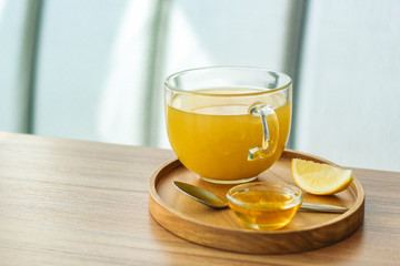 tea lemon, honey, sea buckthorn (warming hot tea, healthy food) menu concept. food background. copy space. Top view