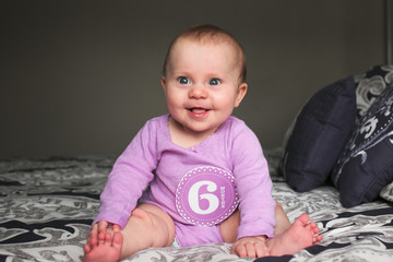 Close up portrait of 6 Month Old Cute Baby Girl, Infant with big blue eyes, New family concept, The most Beautiful Baby Princesse, Happy Baby Girl