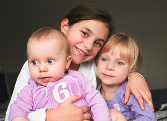 Close up Portrait of Three Beautiful Sisters, One Cute Toddler Girl , 6 Month Old Baby Girl, 7 Years Old Girl, Best Friends Forever, Happy  family concept, The most Beautiful Girls, Princesses 
