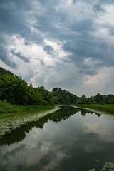 summer, day, travel, walk, rest, nature, forest, trees, green, foliage, river, calm, water, surface, reflection, shore, grasses, gloomy, gray, sky, clouds, bad weather, bad weather, impending, storm, 