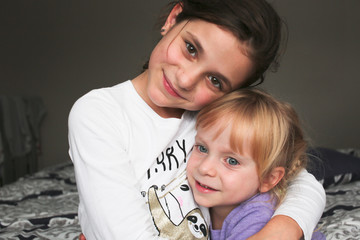 Close up Portrait of Two Beautiful Sisters, One Cute Toddler Girl , 7 Years Old Girl, Best Friends...