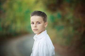 portrait of a adorable boy looking straight into the camera