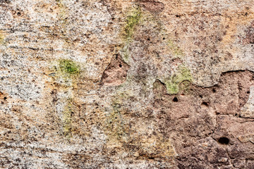 Texture of a concrete wall with cracks and scratches which can be used as a background