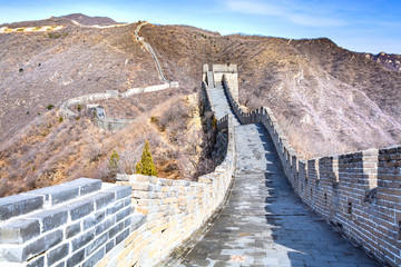 Majestic Great Wall over mountains in Beijing, China.