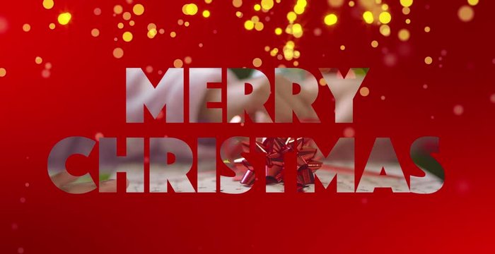 Il testo Merry Christmas animato con scambio di regali al suo interno e stelle