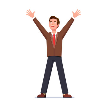 Glad business man standing with raised up hands