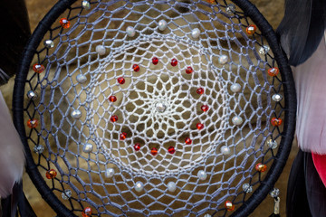 Handmade dream catcher with feathers threads and beads rope hanging