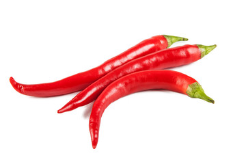 Red oblong peppers on a white background (view from a different angle in the portfolio)