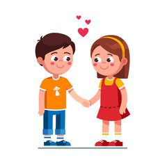 Smiling boy and girl kids holding hands