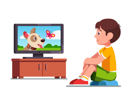 Boy watching film on TV about dog and butterfly