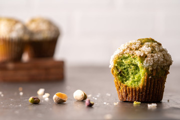 Homemade pistachio muffins with sugar crystals