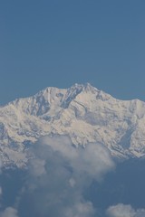 snow clad peaks of mount Kanchenjunga and clear blue sky