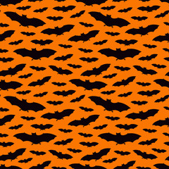 Seamless pattern with bats. Halloween holiday background. Vampire silhouettes print. Trick or treat kids wallpaper