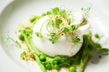 burrata cheese with green peas