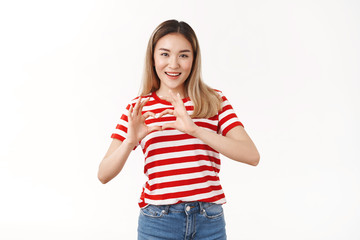 Love peace friendship. Charming asian blond girl express sympathy romantic attitude smiling...