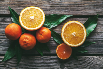 Beautiful composition of tropical fruits on wooden background
