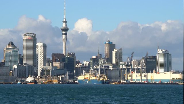 Auckland, New Zealand harbour and city center with Auckland Sky Tower waterfront view from Devonport. Travel attraction in Auckland, New Zealand.