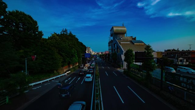 A timelapse of downtown street at Kanpachi avenue in Tokyo daytime wide shot