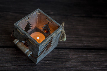 Little baby in red  cap of Santa Claus celebrates Christmas. Christmas  photo of infant newborn in red cap. New Year's holidays and Christmas tree. Little Santa