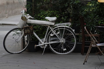 Fototapeta na wymiar Bicycle with basket in sepia, Lille, France