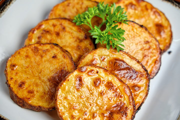 Baked potato with round slices . catering menu