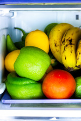 FRUIT VARIED IN FRIDGE. HEALTHY FOOD