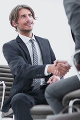 close-up of a businessman holding a briefcase