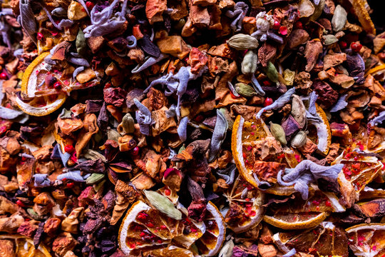 Tea blend with pieces of dried fruit and flowers