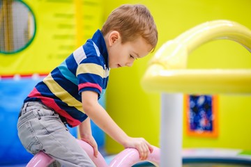 Fototapeta premium Mall fun boy play playground, people.