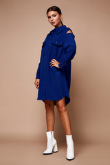 Fototapeta premium Pretty beautiful sexy elegance woman skin tan body fashion model glamor pose wear trend dress casual clothes party fall winter collection makeup hair style brunette success accessory jewelry studio.