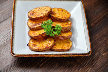 Baked potato with round slices . catering menu