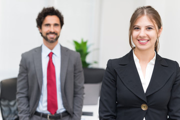 Portrait of young business people in their office