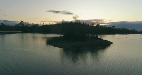 Aerial sunset view of Mina de São Domingos, Tapada Grande River Beach lagoon, famous tourist destination, Alentejo, Portugal.