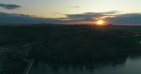Aerial sunset view of Mina de São Domingos, Tapada Grande River Beach lagoon, famous tourist destination, Alentejo, Portugal.