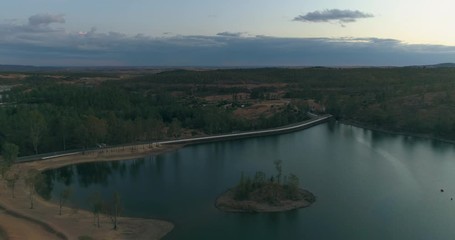Aerial sunset view of Mina de São Domingos, Tapada Grande River Beach lagoon, famous tourist destination, Alentejo, Portugal.