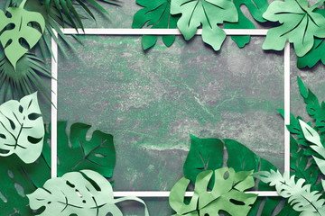 Paper craft background, frame with exotic tropical leaves with text space on dark