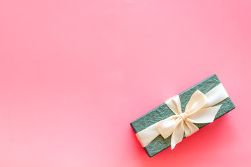 box with present for holiday on pink background top view mockup