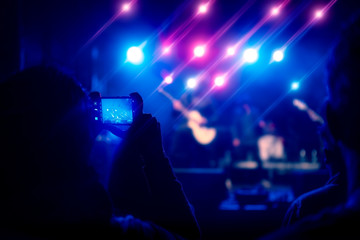 Obraz na płótnie Canvas Fans enjoying festival music concert.