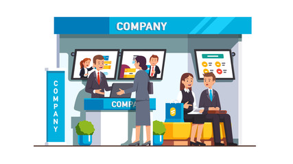 Business woman with company clerk at trade show