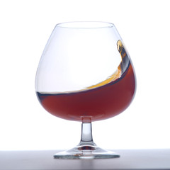 splash of brandy in a glass