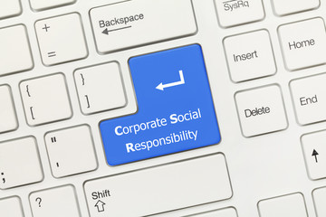 White conceptual keyboard - Corporate Social Responsibility (blue key)