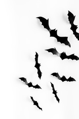 Bats cutout on Halloween frame on white table top view copy space