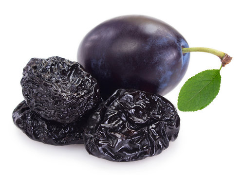 Fresh plums with prunes on white background