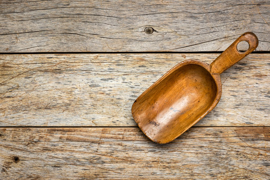 empty rustic wooden scoop