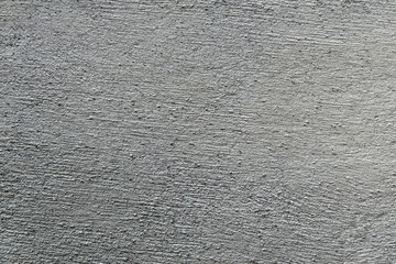 building background: rough wall of lime plaster
