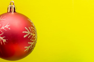 Vintage Ornament Christmas Decoration on bright yellow background. Winter Holidays concept.