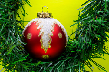 Vintage Ornament Christmas Decoration on bright yellow background. Winter Holidays concept.