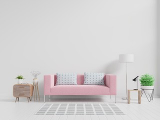 Modern living room interior with pink sofa and green plants,lamp,table on white wall background.